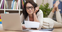 Woman looking at paperwork