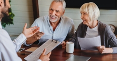 Senior couple opening a bank account