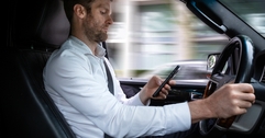 Man texting and driving