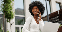 Smiling woman talking on phone
