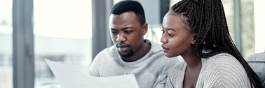 Couple looking at bank statements