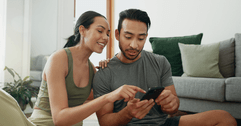Couple looking at phone