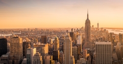 View of New York City skyline from high up at sunset