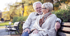Older couple sitting on bench