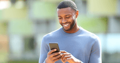 Man using iPhone