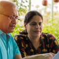 Senior couple reviewing bills