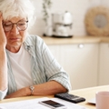 senior woman pensioner having depressed look