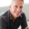 portrait of single 40s man sitting in sofa