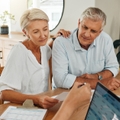 financial advisor consultation with clients on retirement