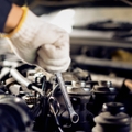 Mechanic working on car
