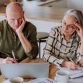 senior couple stressing about budget