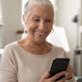 Older woman using a phone