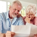 senior  couple reviewing bills