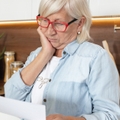 upset adult woman financially stressed