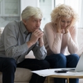 concerned mature husband and wife