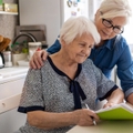 elderly mother with paperwork