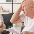 senior couple in debt