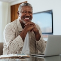  senior man working on laptop