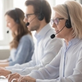 call center employee sitting at workplace