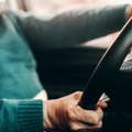 senior man driving his car