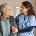 caregiver assist senior woman