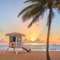 beach and life guard tower at sunrise