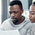Couple looking at bank statements