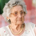elderly woman wearing glasses