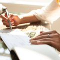 person signing check