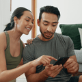 Couple looking at phone
