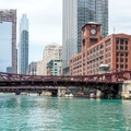 Chicago river with bridge and buildings in background