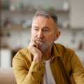 Portrait of thoughtful senior man looking away