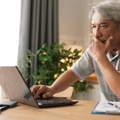 business man working and using computer