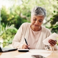 old woman writing