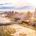 Atlantic City, New Jersey, as seen from aerial view featuring boardwalk and buildings