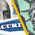 Close up of Social Security cards and checks