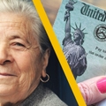 older woman smiling with social security check