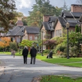 Senior couple walking around retirement community