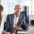 financial advisor with clients