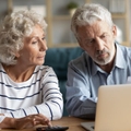 retired couple doing taxes