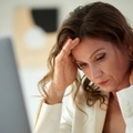 Stressed overworked female entrepreneur
