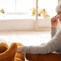 Widow looking at empty chair