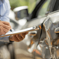 Car insurance adjuster evaluating accident