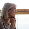 Pensive looking mature woman