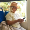 Senior woman riding the bus