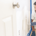 Man painting wall for odd job
