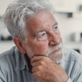 Portrait of a retired man looking concerned
