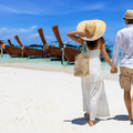Tourist couple on beach in Thailand
