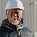 Smiling senior male construction manager