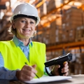 Older woman working in warehouse